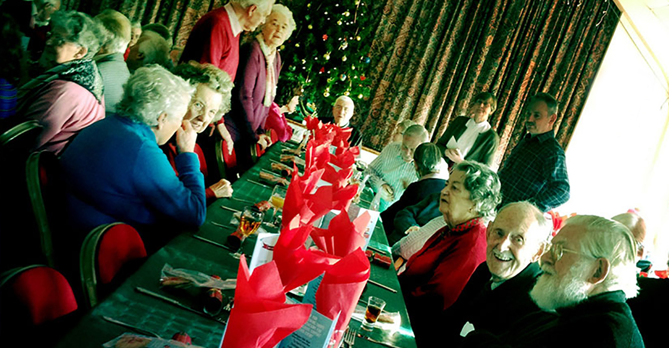 'Elderly people enjoying Christmas'